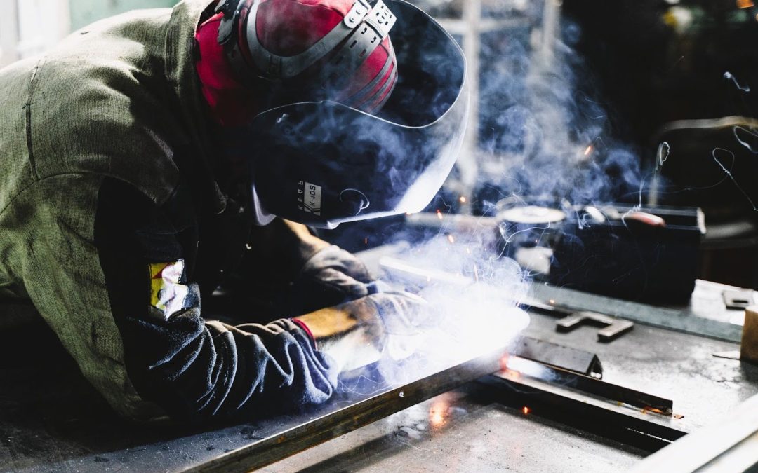 Man welding construction steel